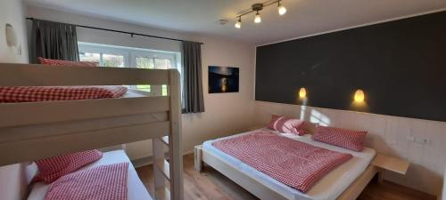 Postel nebo postele na pokoji v ubytování Ferienhof Bieke