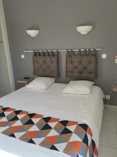 Katil atau katil-katil dalam bilik di Carry Hotel