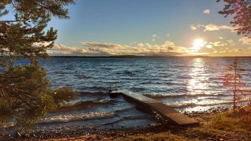 a dock on a large body of water at Porotieva in Posio