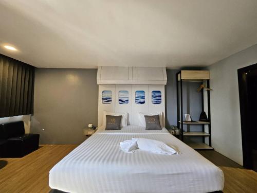 Oscar Palace Hotel & Wellness Centerにあるベッド
