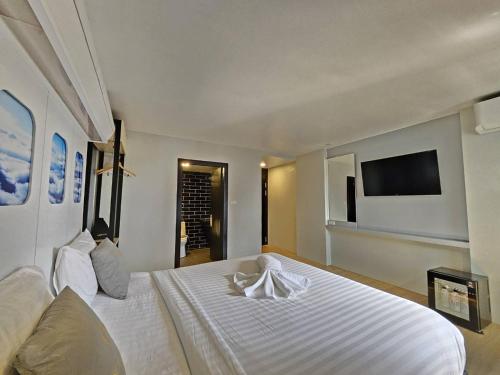 Oscar Palace Hotel & Wellness Centerにあるベッド