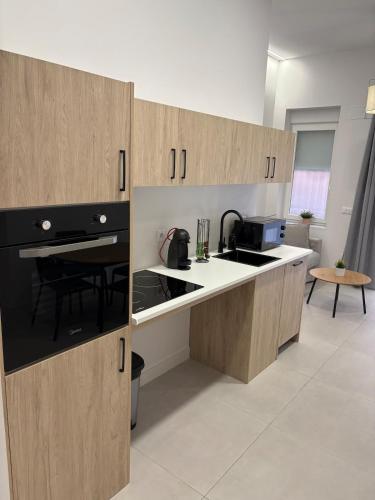 Kuchyň nebo kuchyňský kout v ubytování Centric Loft near Arts & Science