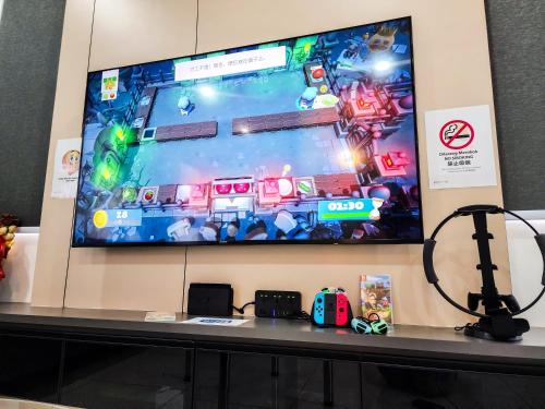 Μια τηλεόραση ή/και κέντρο ψυχαγωγίας στο Austin Crest -- Nintendo, BBQ, Scooter, Spacious - 4BR3B - 10pax by Cowidea