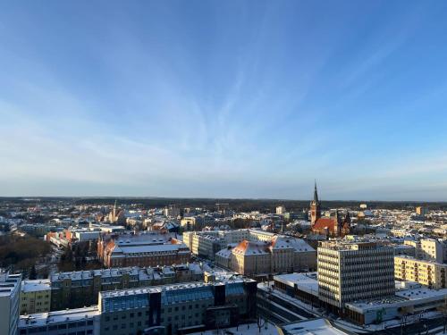 Nespecifikovaný výhled na destinaci Olštýn nebo výhled na město při pohledu z apartmánu