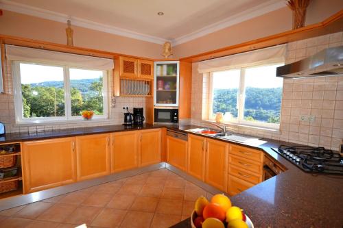 Η κουζίνα ή μικρή κουζίνα στο Villa Vida Nova