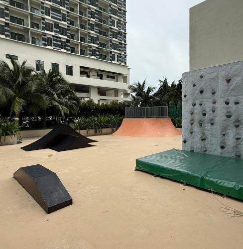 a skate park with a skateboard ramp and a skateboard ramp at New l Seaview l Bali Residence l Kids Tent l 8 pax l Water Theme Park l Netflix in Tranquerah
