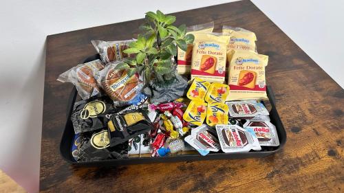 a tray of chips and other snacks on a table at Maison Ursino in Catania
