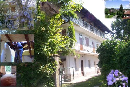 a man is on the side of a building at B&B Balestruccio in Pombia