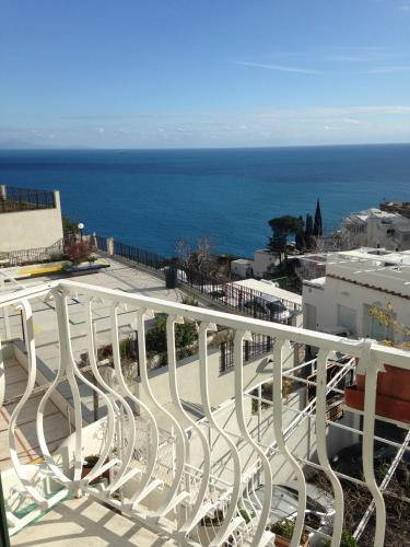a view of the ocean from the balcony of a building at Hotel Villa Delle Palme in Positano in Positano