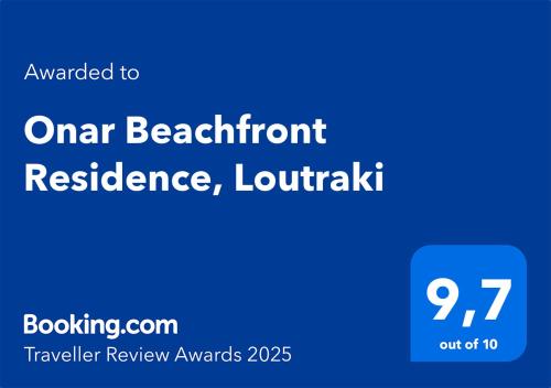 a blue sign with the words ontarioario beretront resilience andaughiki at Onar Beachfront Residence, Loutraki in Loutraki