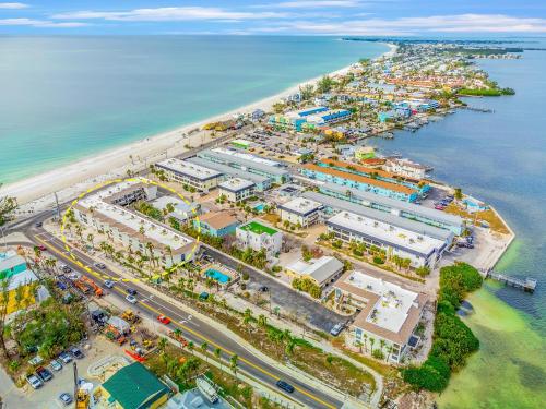 an aerial view of a city next to the ocean at Bridgeport Condo 209 in Bradenton Beach