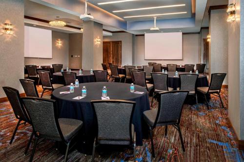 a conference room with a long table and chairs at Residence Inn by Marriott National Harbor Washington, D.C. Area in National Harbor