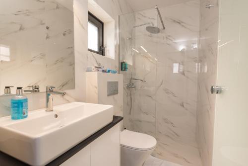 Koupelna v ubytování Gestema Luxury Residences