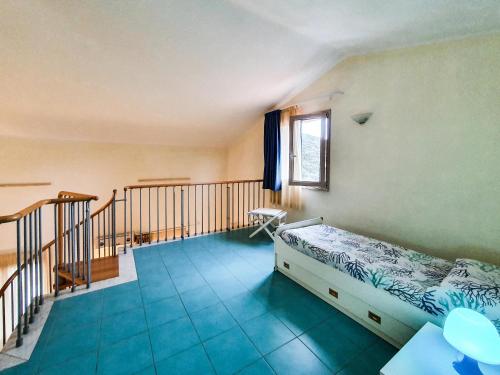 Postel nebo postele na pokoji v ubytování La Pergola al Cavo 9