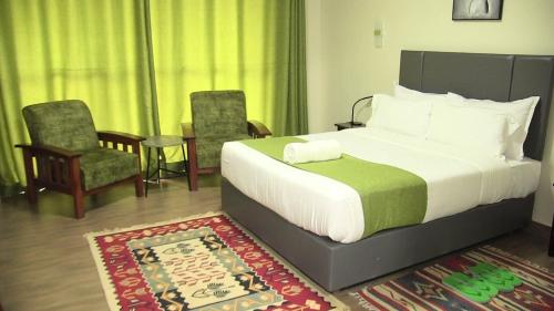 Westside Hotel Kitaleにあるベッド