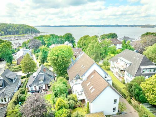 an aerial view of a residential neighborhood with houses at Backbord in Ulstrupfeld