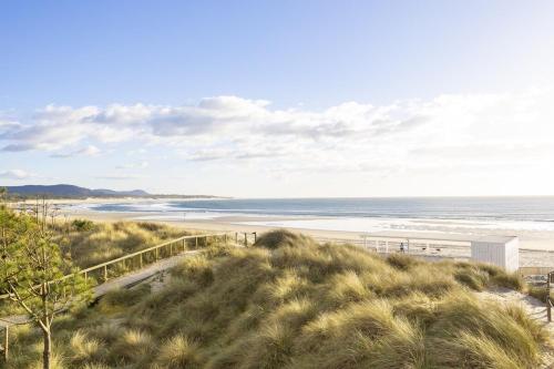 a view of the beach from the top of a hill at Divine Waves Duplex by Portugal Active in Viana do Castelo