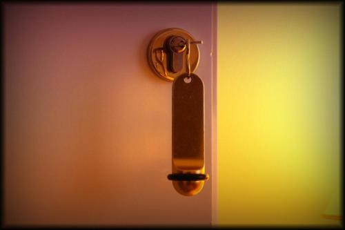 a wall with a thermostat hanging on a wall at Hotel Vila Tina in Zagreb