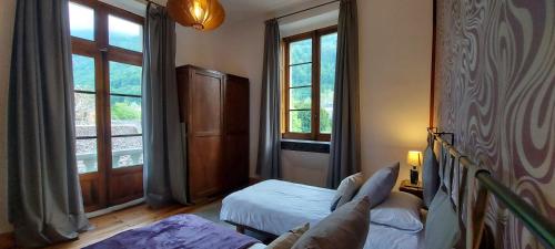 Ein Bett oder Betten in einem Zimmer der Unterkunft Villa Gracieuse