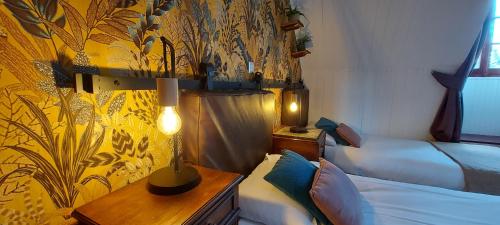 Ein Bett oder Betten in einem Zimmer der Unterkunft Villa Gracieuse