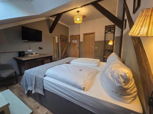 Postel nebo postele na pokoji v ubytování Aparthotel Fairschlafen Minden