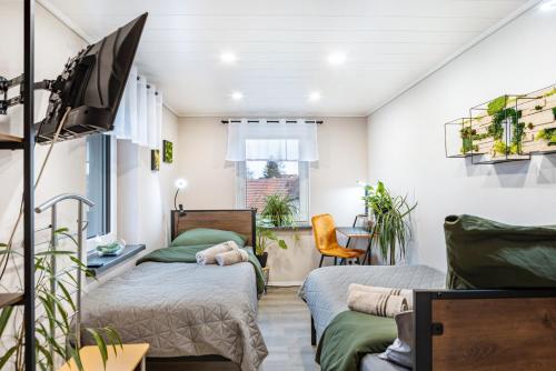 Ένα ή περισσότερα κρεβάτια σε δωμάτιο στο Ferienhaus Kirsch