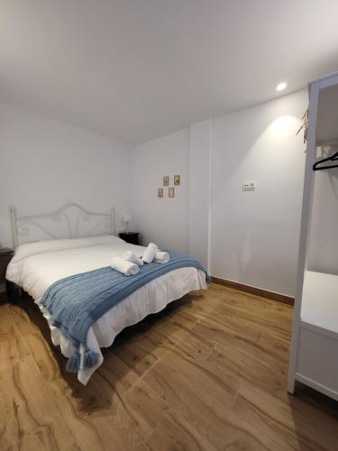 Ένα ή περισσότερα κρεβάτια σε δωμάτιο στο Apartamento Argón- Aire