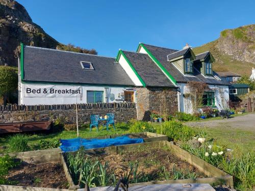 a house with a garden in front of it at Garragh Mhor in Oban