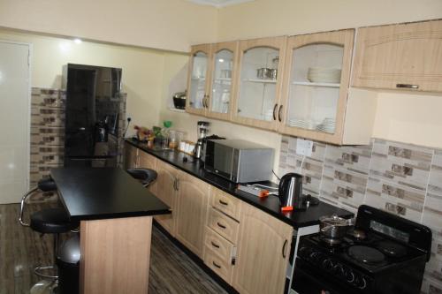 Kuchyň nebo kuchyňský kout v ubytování Ashdown House