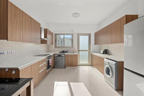 Kuchyň nebo kuchyňský kout v ubytování Downtown Comfort Apartment