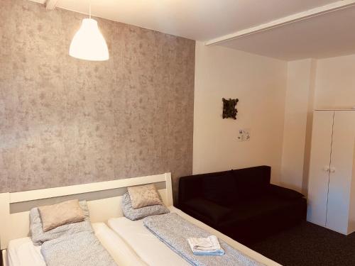 Ένα ή περισσότερα κρεβάτια σε δωμάτιο στο Veni Apartments