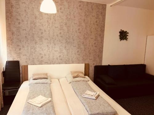 Ένα ή περισσότερα κρεβάτια σε δωμάτιο στο Veni Apartments