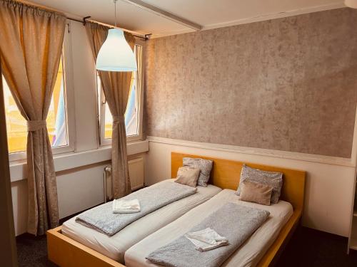 Ένα ή περισσότερα κρεβάτια σε δωμάτιο στο Veni Apartments