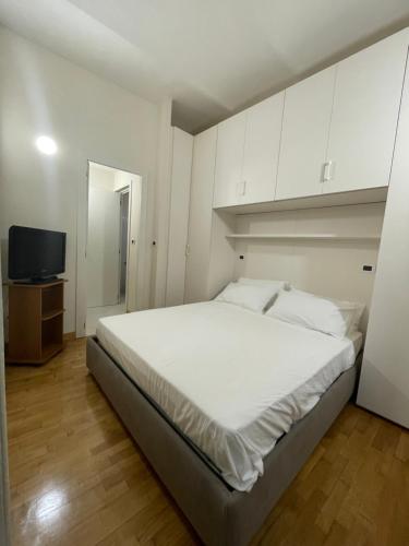 Ένα ή περισσότερα κρεβάτια σε δωμάτιο στο Casa Martino