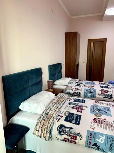 Katil atau katil-katil dalam bilik di Apex International Family House