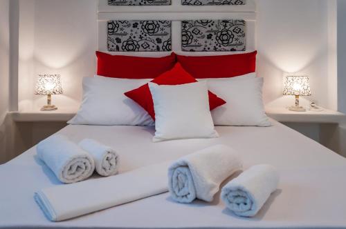 Postel nebo postele na pokoji v ubytování Oceanis Rooms