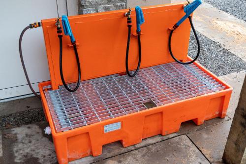 an orange crate sitting on the side of a building at Rock Mill 1 Bed Apartment 4 in Stoney Middleton