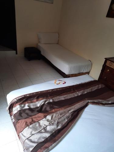 Letto o letti in una camera di Riad Lalla Khiti