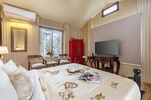 TV a/nebo společenská místnost v ubytování ELIVAAS Zephyr - Luxury cottages near Kempty Falls