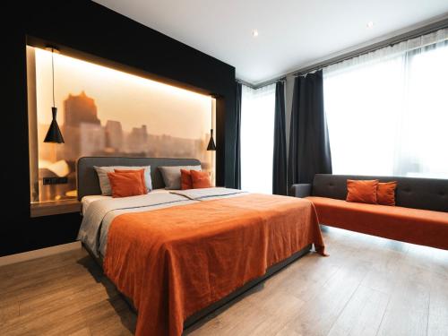 Ένα ή περισσότερα κρεβάτια σε δωμάτιο στο JustStay Grevenbroich Hotel & Apartments