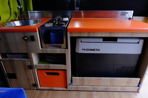 a toy kitchen with a stove and a sink at Happy Campers - Camper van rental in Keflavík