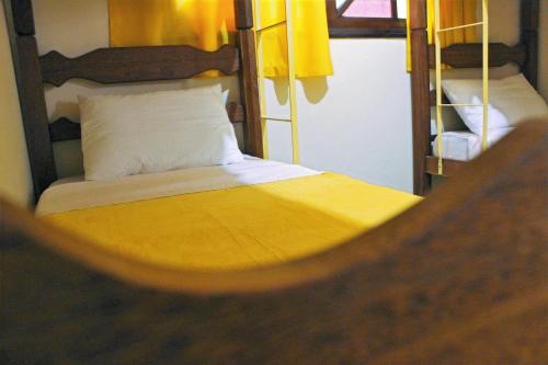 a reflection of a bedroom with two bunk beds at Casa Monjardim in Vitória