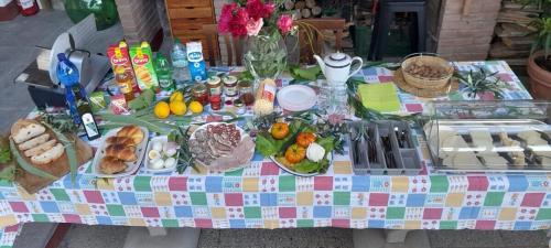 a table full of food on top at La sosta di Fano in Reggello