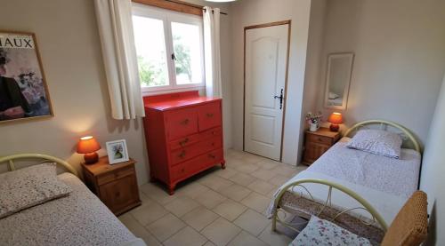 Postel nebo postele na pokoji v ubytování Le Gîte de la Fontaine - Aumes