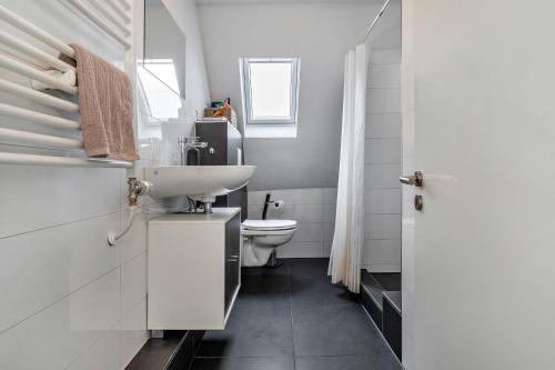 Ένα μπάνιο στο Ferienwohnung zur Grenze