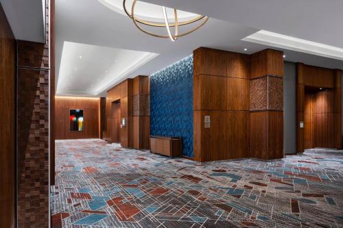 a lobby with a mosaic floor and a chandelier at Residence Inn by Marriott Washington Downtown/Convention Center in Washington