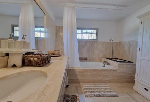 Ένα μπάνιο στο Jardin-duzes