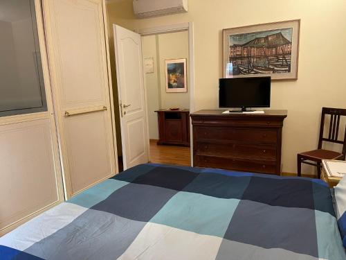 TV a/nebo společenská místnost v ubytování La Casa nel Borgo