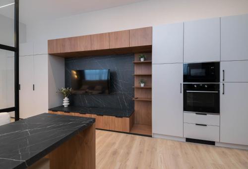 Кухня или мини-кухня в Apartmány Ružomberok
