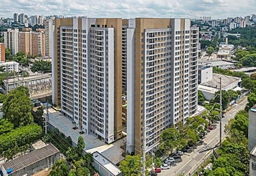 an aerial view of a city with tall buildings at Tropical apartament in Sao Paulo
